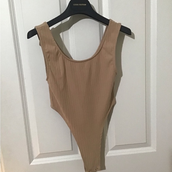 CAPELLA Tops - Very Nice CAPELLA BodySuit Size Small.Snaps on Bottom.Great Condition.See Pics.